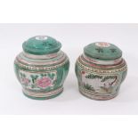Two Chinese polychrome enameled yixing pottery jars and covers