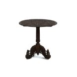19th century Indian carved circular table on tripod base