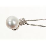 Cultured freshwater pearl and diamond pendant with a 12.8mm diameter cultured pearl in 18ct white