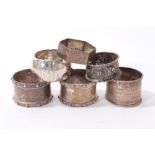 Selection of six silver/white metal napkin rings (various dates and makers).