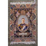 Fine 1930s-1950s Persian silk pictorial rug depicting H.M. King George VI in naval uniform