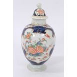 Late 18th century Worcester tea caddy, decorated in polychrome enamels with floral patterns inside