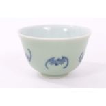 Chinese celadon glazed tea bowl, decorated in underglaze blue with bats