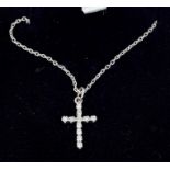 18ct white gold and diamond set cross pendant on chain