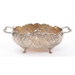 German Silver two handled bowl of oval form, on paw feet