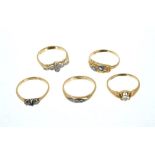 Five 18ct gold and gem set rings