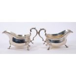 Pair of George V silver sauce boats with gadrooned borders