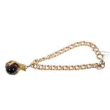 Edwardian gold bracelet with gold eagle claw fob