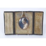 Early 20th century overpainted photographic portrait miniature on ivory