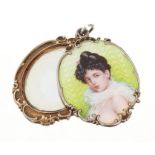 Edwardian silver and enamel pendant with concealed mirror, the front with guilloche enamel portrait