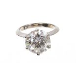 Fine diamond single stone ring with a round brilliant cut diamond weighing 5.03 carats, accompanied