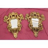 Pair of late 19th century Rococo carved wood and gilt girondole mirrors