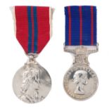 Two medals issued to Bert Heuston gamekeeper at Sandringham