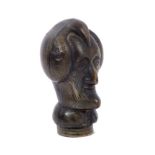Unusual 19th century novelty carved horn desk seal in the form of Abraham Lincoln