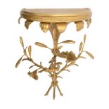 A pair of George III giltwood and gesso wall brackets