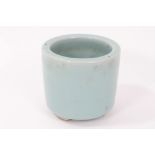 Chinese celadon glazed brush pot, evenly covered in a light blue glaze