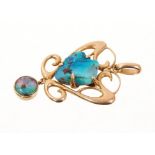 Art Nouveau 15ct gold and opal pendant in the manner of Archibald Knox