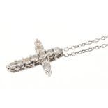 Diamond cross pendant on platinum chain