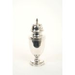 Silver sugar castor with reeded decoration.