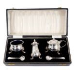 Good Quality Contemporary silver three piece cruet set in a fitted case