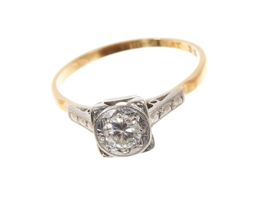 Art Deco diamond single stone ring with square platinum setting