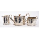 Victorian Silver three piece tea set of drum form, with engraved decoration