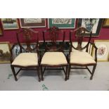 Long set of twelve Hepplewhite style mahogany dining chairs