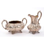Victorian silver cream jug of lobed baluster form, and matching sugar bowl.