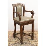 Mesopotamian style ornate carved hardwood elbow chair. Provenance: Removed from Gilgamesh