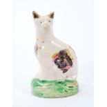 Late 18th century Staffordshire creamware model of a seated cat