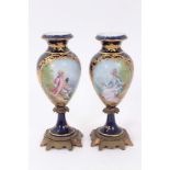 Pair of Sevres style vases with metal mounts