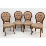 Set of four Victorian mahogany dining chairs with striped upholstery