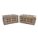 Unusual near pair of Eastern carved sandalwood and mother-of-pearl inlaid trunks