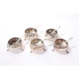 Five Georgian and later silver cauldron salts, together with five condiment spoons.