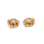 Pair of diamond and rose gold earrings of stylized rose design, old cut and single cut diamonds in