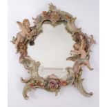 Ornate 19th century continental porcelain mirror