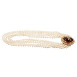 Cultured pearl five-strand choker necklace with cabochon garnet and diamond cluster clasp