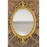 Victorian oval gilt framed mirror