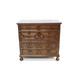 Charles II oak geometric chest of drawers