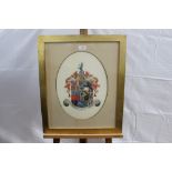 A pair of early 20th century oval pen, ink and watercolour armorial relating to the Bigg-Wither