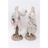 Pair of large Continental Porcelain figures of a lady and gentleman