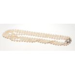 Cultured Baroque pearl necklace with three strings of graduated pearls measuring 6.8 to 9.7mm on a