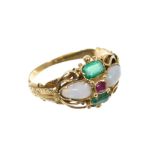 Regency/Early Victorian gold ruby, emerald and opal ring with textured gold foliate shoulders on