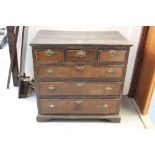 Mid 18th century oak and fruitwood crossbanded chest of three short and three long drawers on