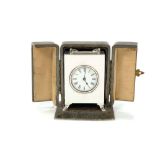 Silver Carriage clock in leather travelling case