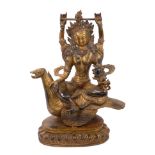 Antique Tibetan gilt bronze figure of Tara Sarawati riding a Hamsa bird