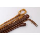 Old stepped Malacca walking cane with gold coloured eyelets together with a Congo cane stick,