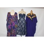 1950's and 70's dresses including blue lace strapless dress, printed hostess dress with bat wing