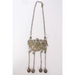 Old Chinese white metal necklace with embossed plaque depicting a figure on a dragon/horse, with