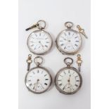 Four Edwardian silver key wind open face pocket watches